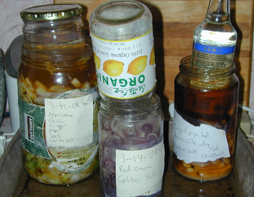 Kim Chee, Onion Pickles, and Turnip Pickles fermenting