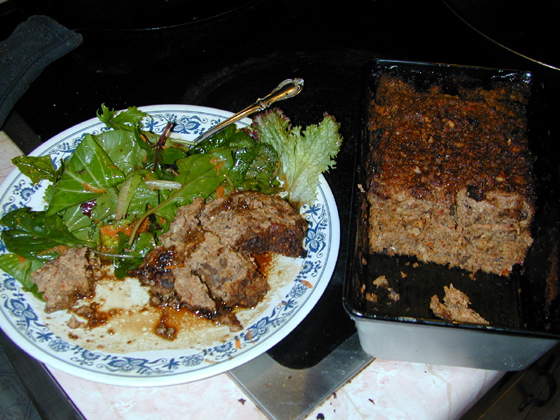 Nutloaf cooked and plated with salad and balsamic vinegrette