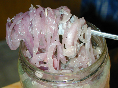 Sliced red onions in a bowl