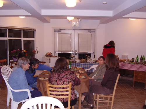 People gathered around the main table