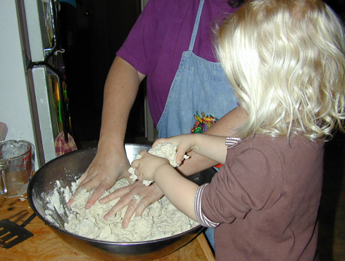 Cyndi & Miriam mixing tortilla dough
