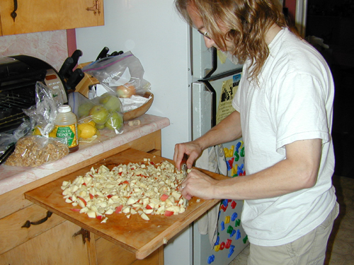 Michael chopping apples for charoset