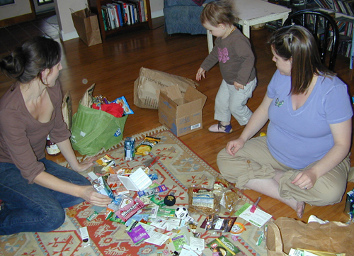 Jessica & Monica going through Expo West Booty, with help from Roxie