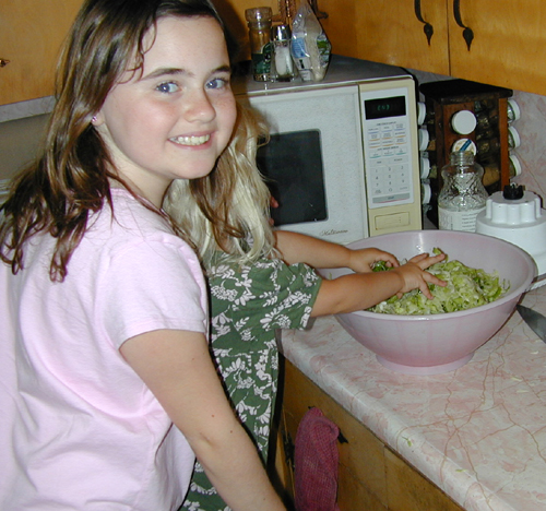 Stephanie & Miriam mix the coleslaw