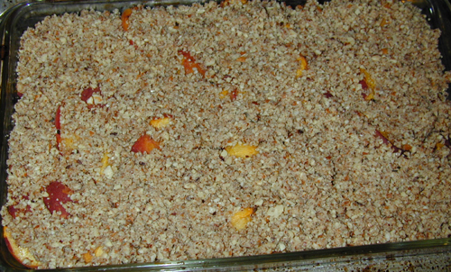 Peach cobbler in the pan ready to cook