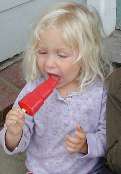 Miriam eating a popsicle