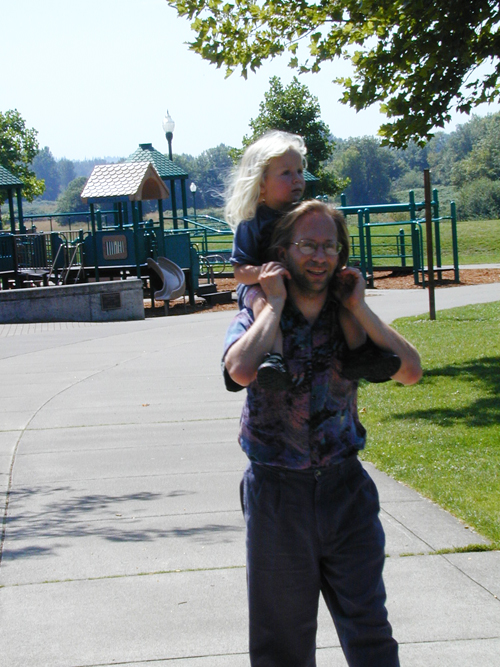 A very hot and tired Miriam & Michael heading away from the Riverfront Park playground