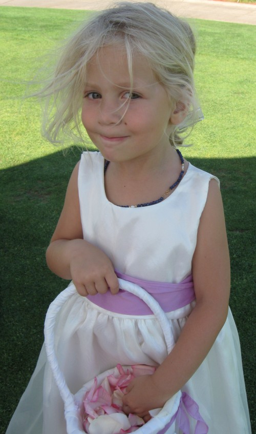 Miriam as a flower girl at her Uncle Mike's wedding 7/19/09