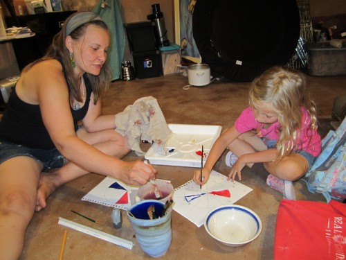 Aralia teaches Miriam how to make a color wheel